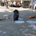 Gordon Ashworth painting flagstones with chalks