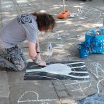 Gordon Ashworth making chalk artworks